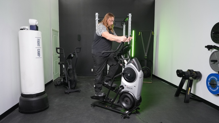 An athlete works out on the Bowflex Max Trainer M6.